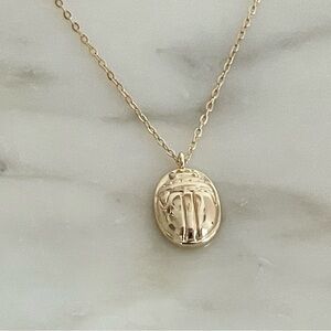 Dainty gold scarab necklace